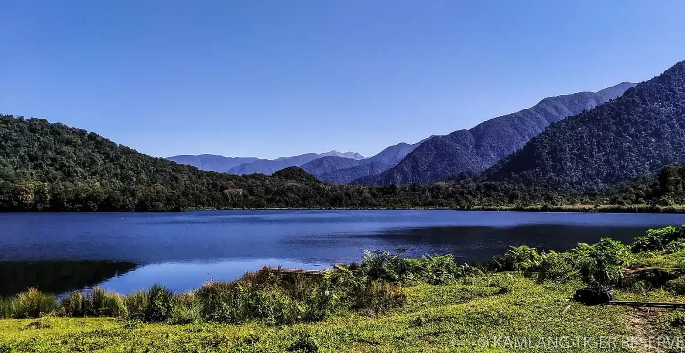 Alpine lake framed by mountains in Arunachal Pradesh