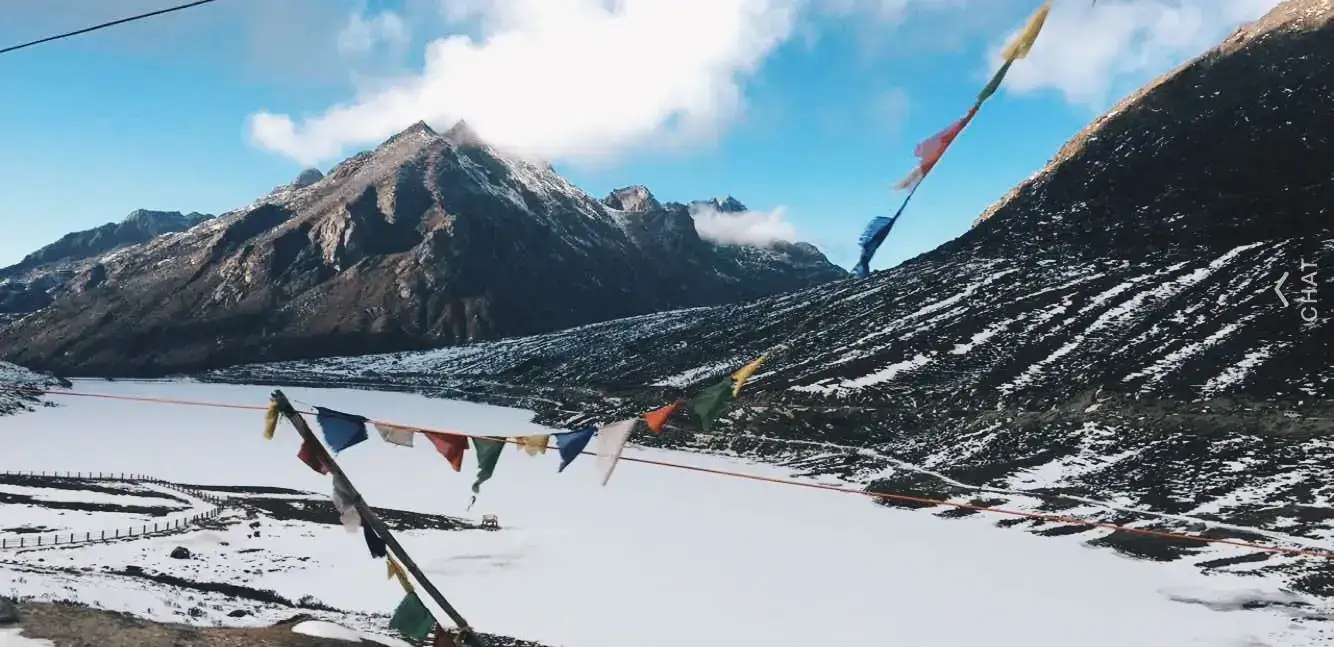 Snow peaks and prayer flags on a winter trip to Arunachal Pradesh