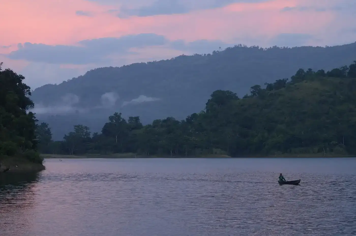 Boat on Doyang reservoir at dusk, Nagaland