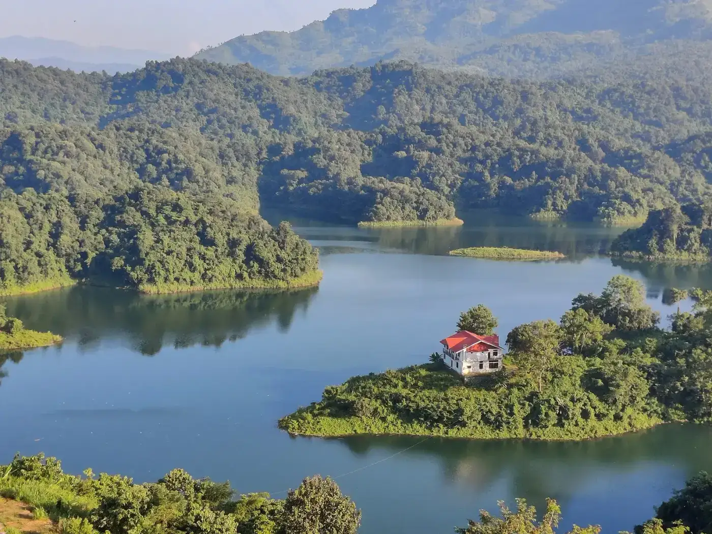 Doyang reservoir with a forested island in Wokha district