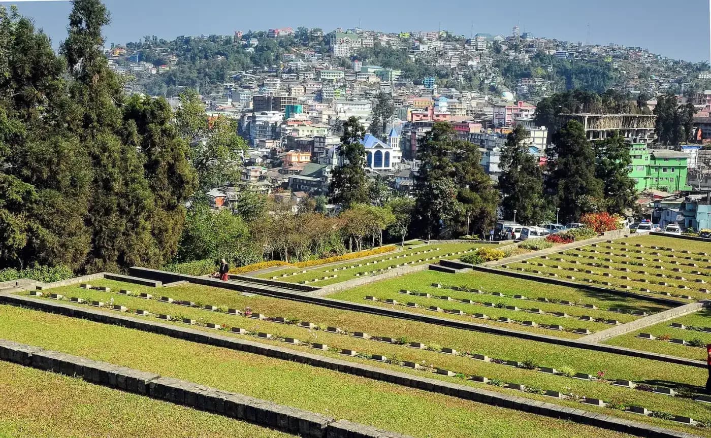 Terraced graves of the Kohima War Cemetery overlooking the town