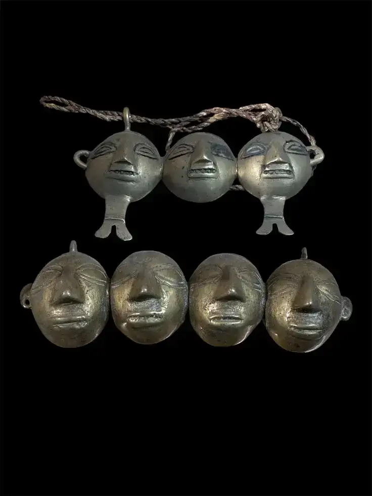 Traditional Konyak brass head ornaments