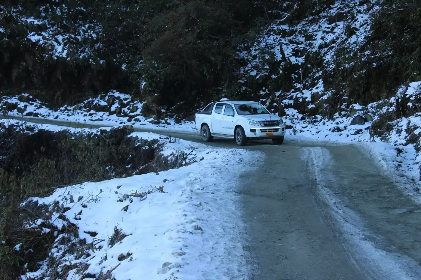 Snow-covered road at Mayudia Pass in winter