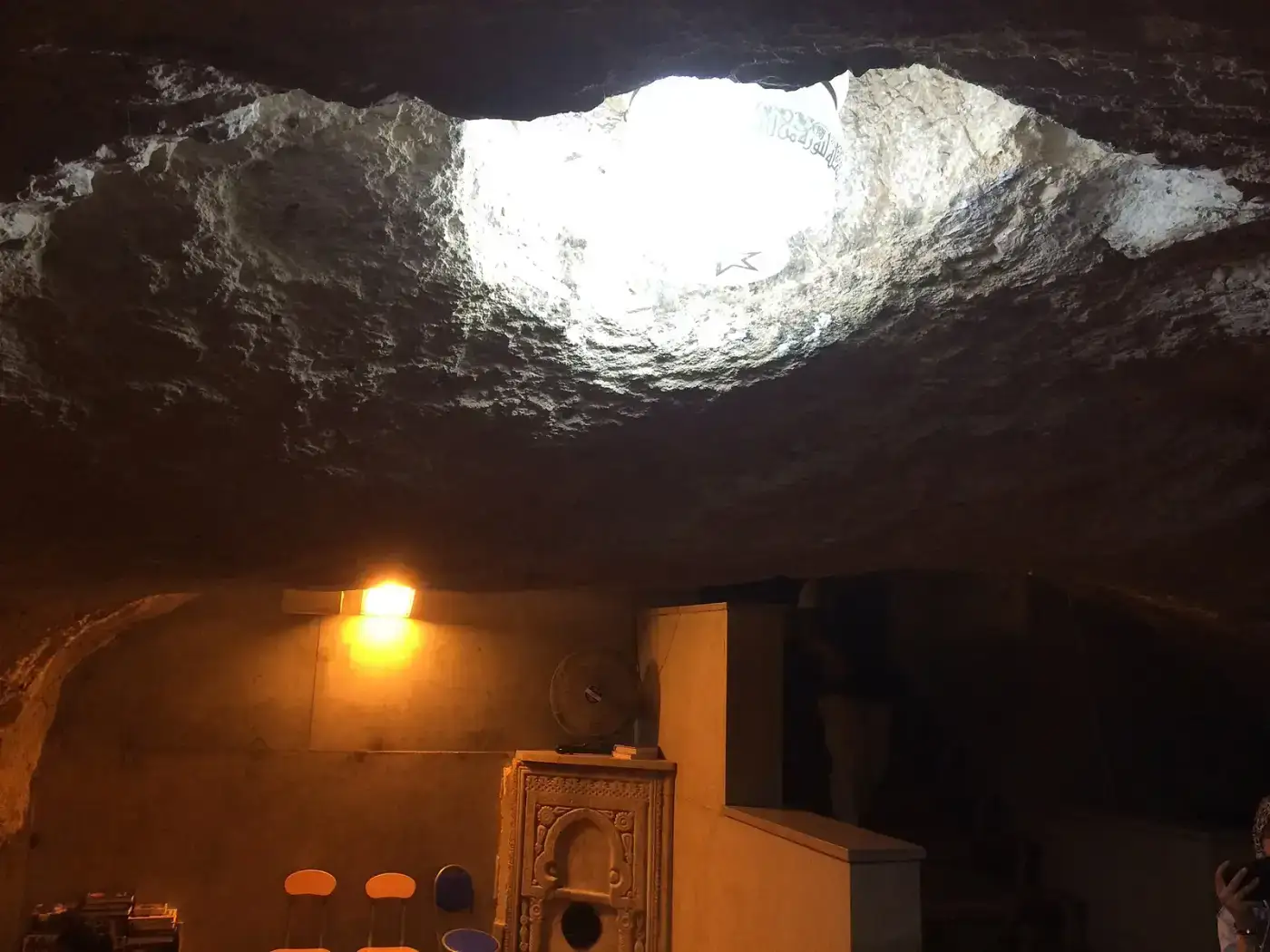 Light pouring through a cave opening in Meghalaya