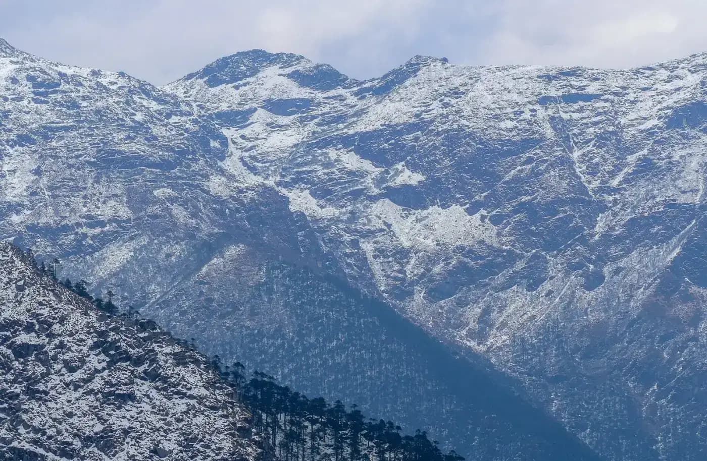 Snow-dusted mountains seen from Sela Pass