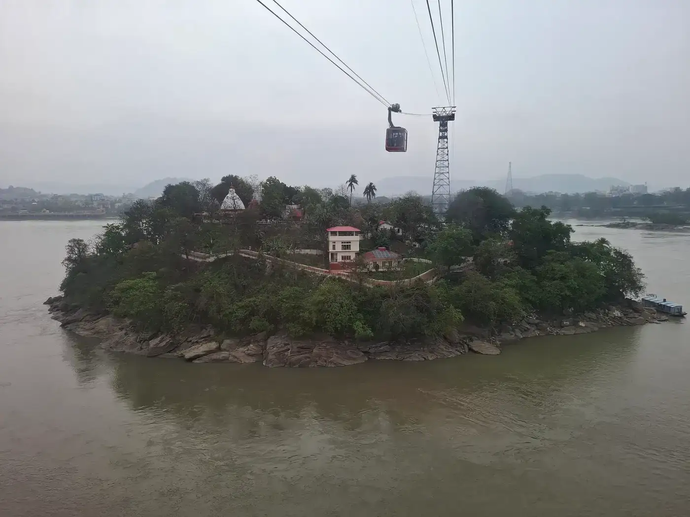 Umananda (Peacock) Island with the Guwahati ropeway cables overhead
