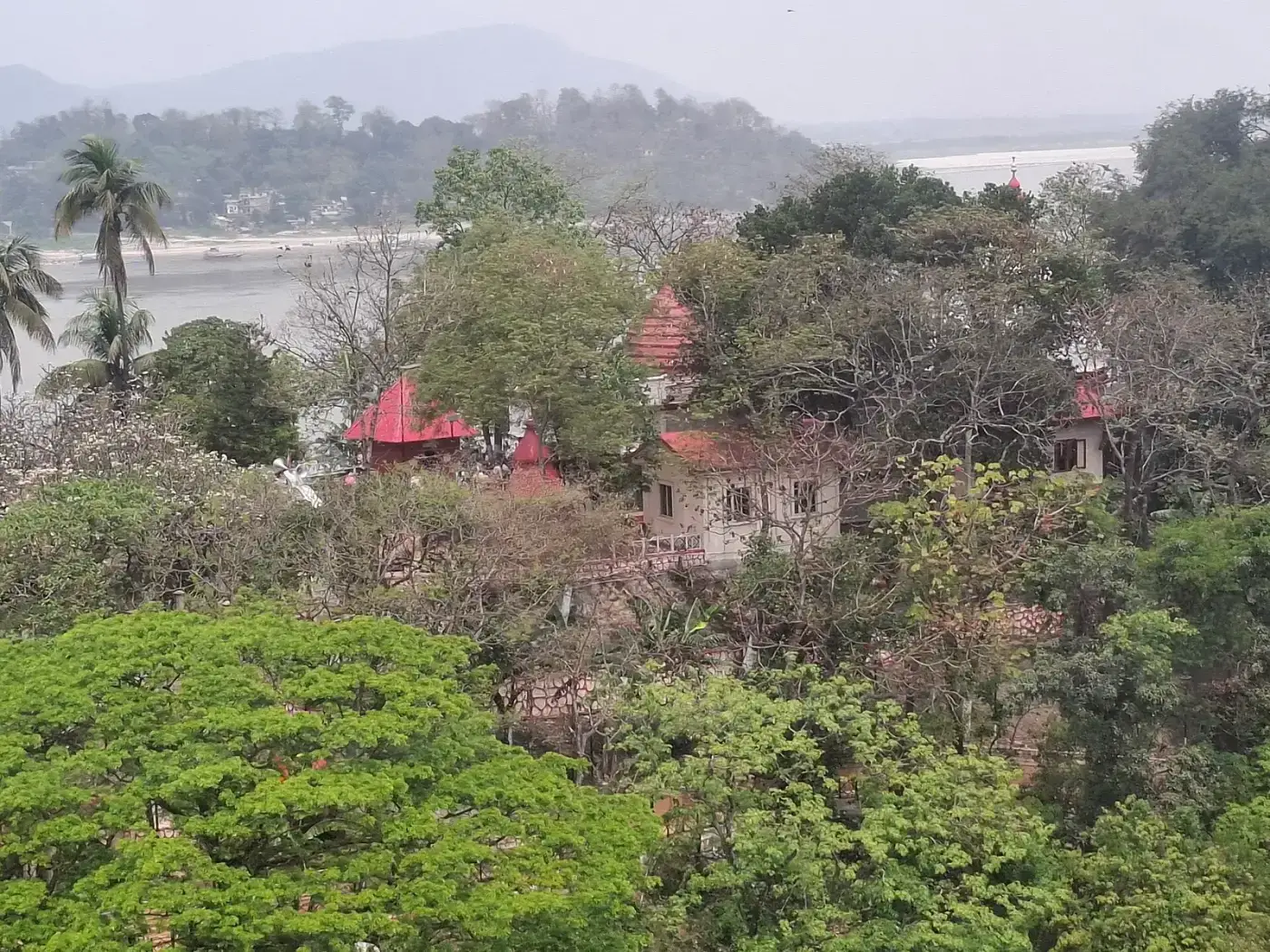 Umananda Temple among the trees on Peacock Island, Guwahati