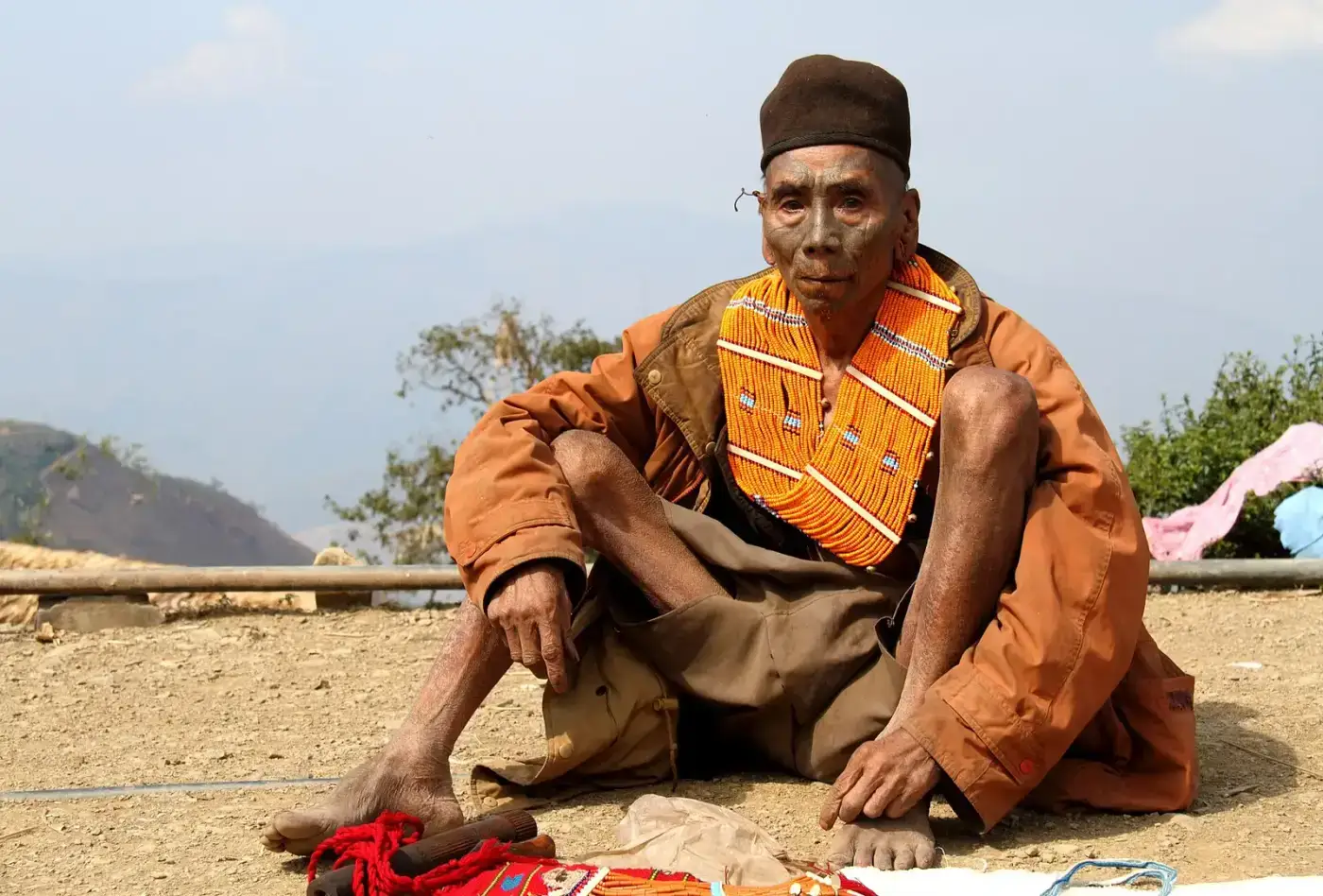 Konyak elder in traditional attire, Mon district