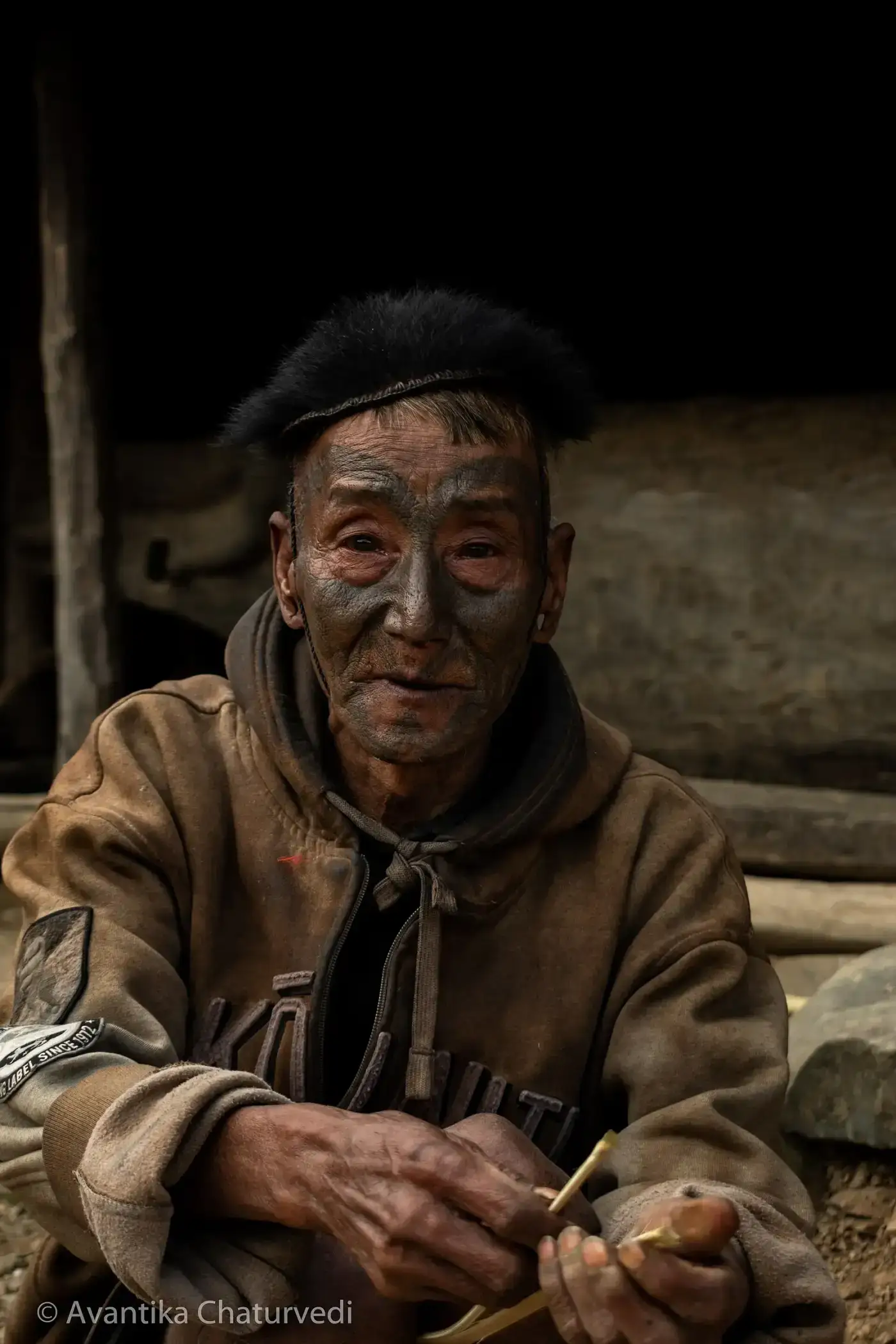 Tattooed Konyak elder in Longwa village, Mon district, Nagaland
