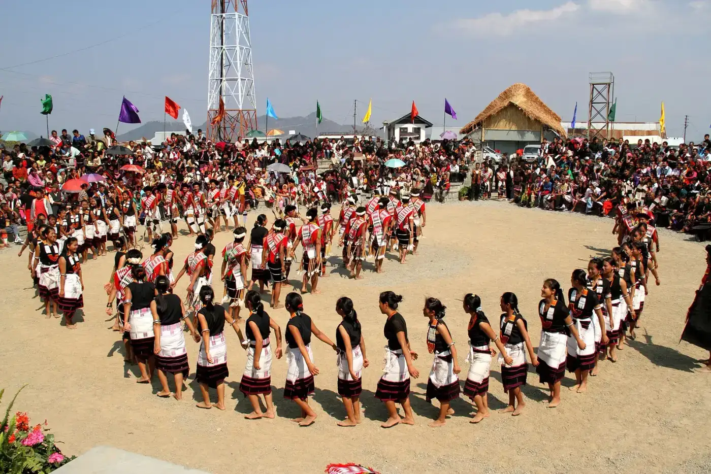 Naga dancers performing a circle dance at a festival