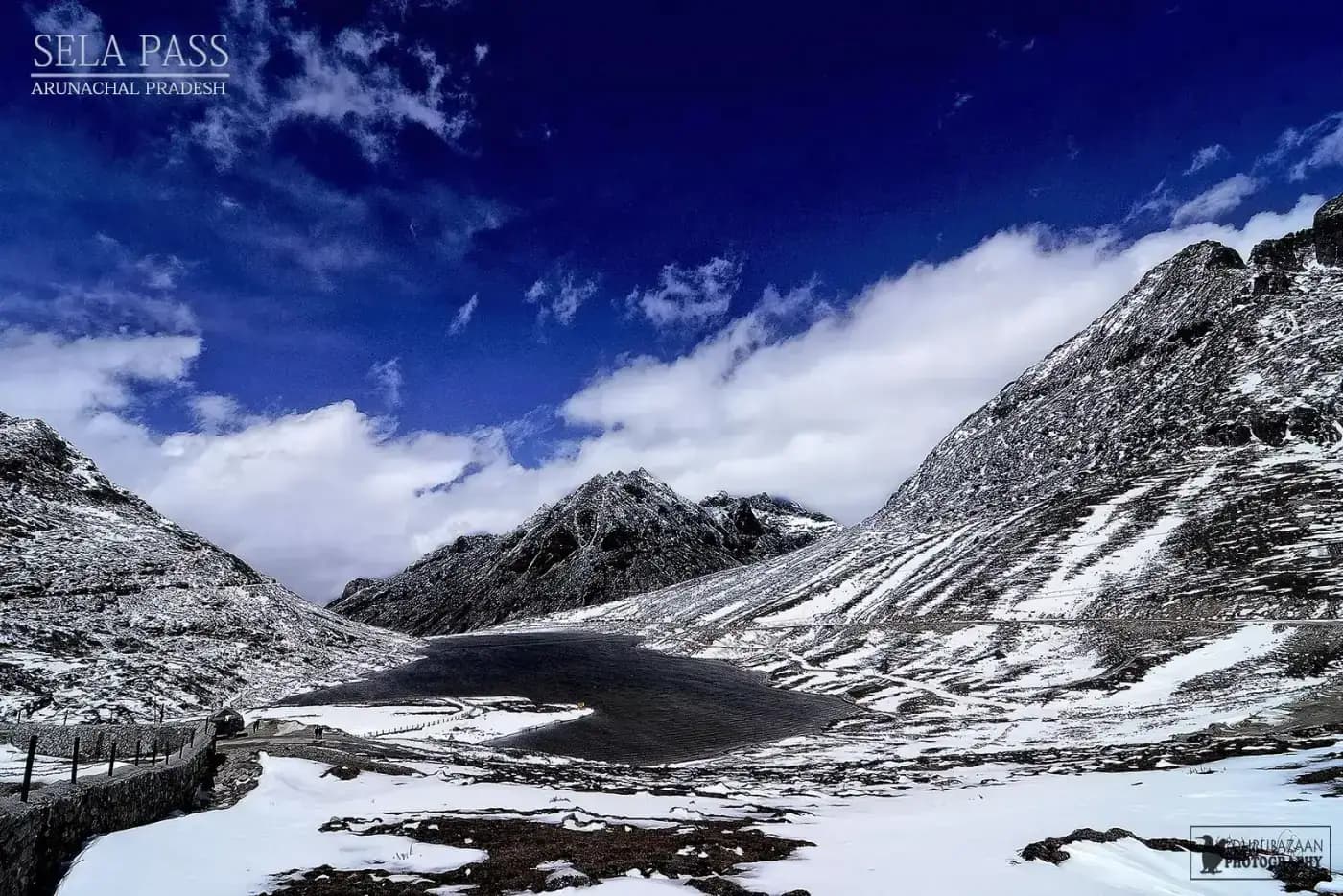 Snow-covered Sela Pass and lake at 4,170 m on the road to Tawang