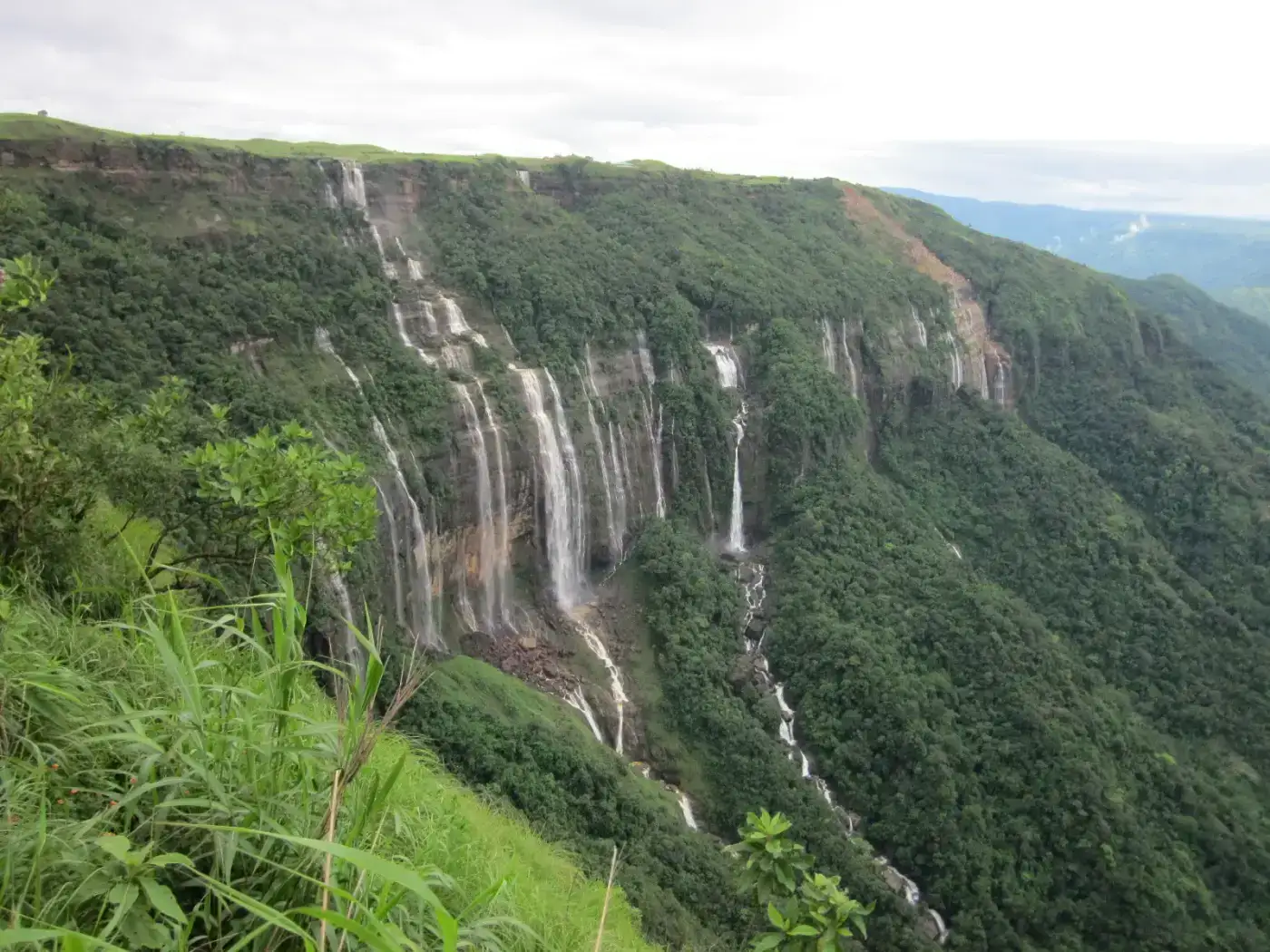 Seven Sisters Falls (Nohsngithiang) streaming over limestone cliffs