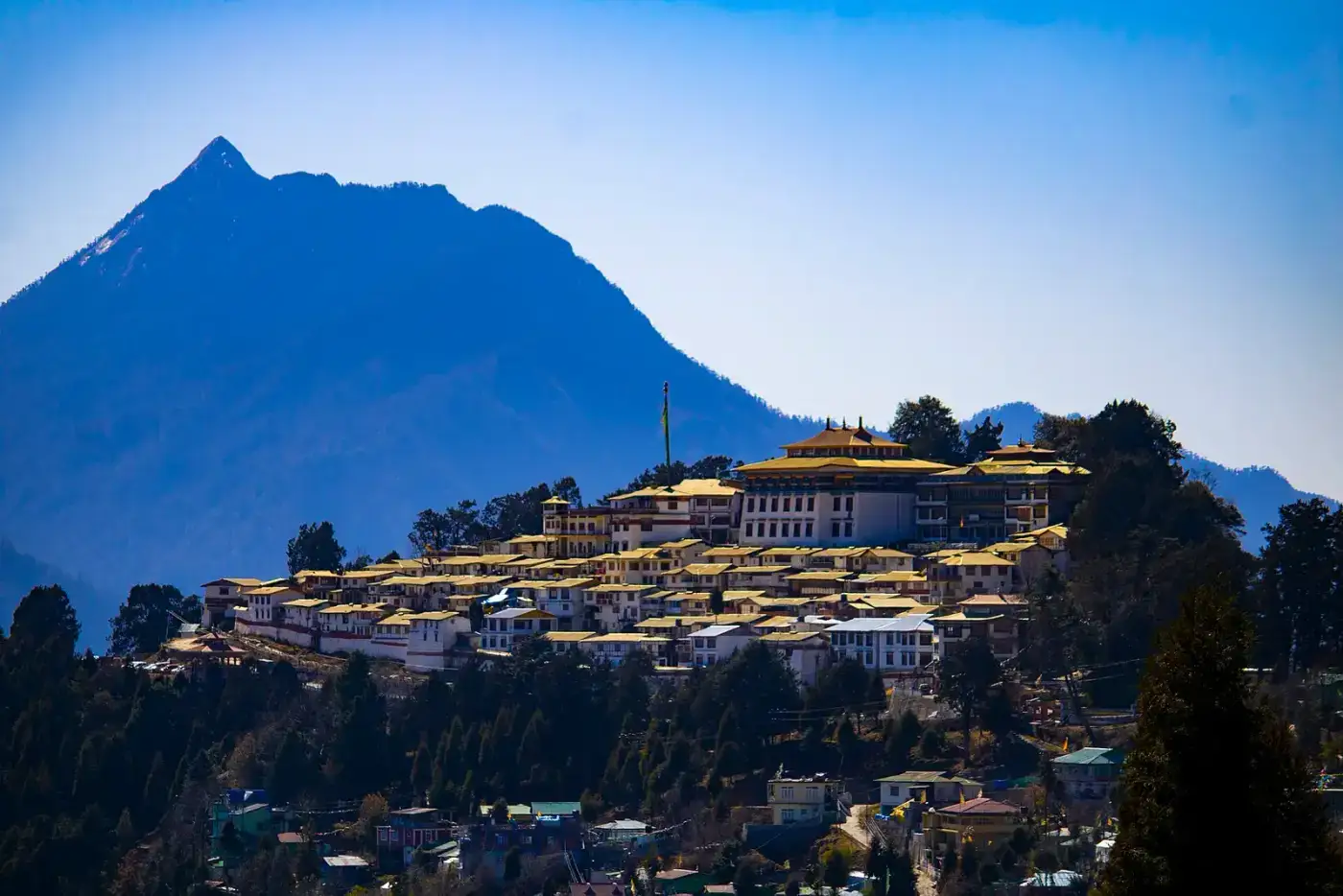 Tawang Monastery spread across a ridge beneath mountains in Arunachal Pradesh